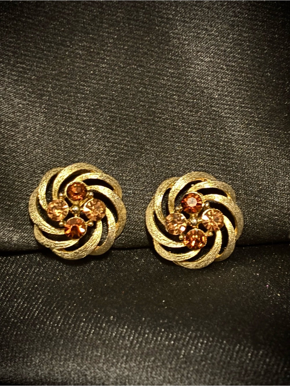 Vintage signed Lisner gold swirl screw back earrings with amber stones